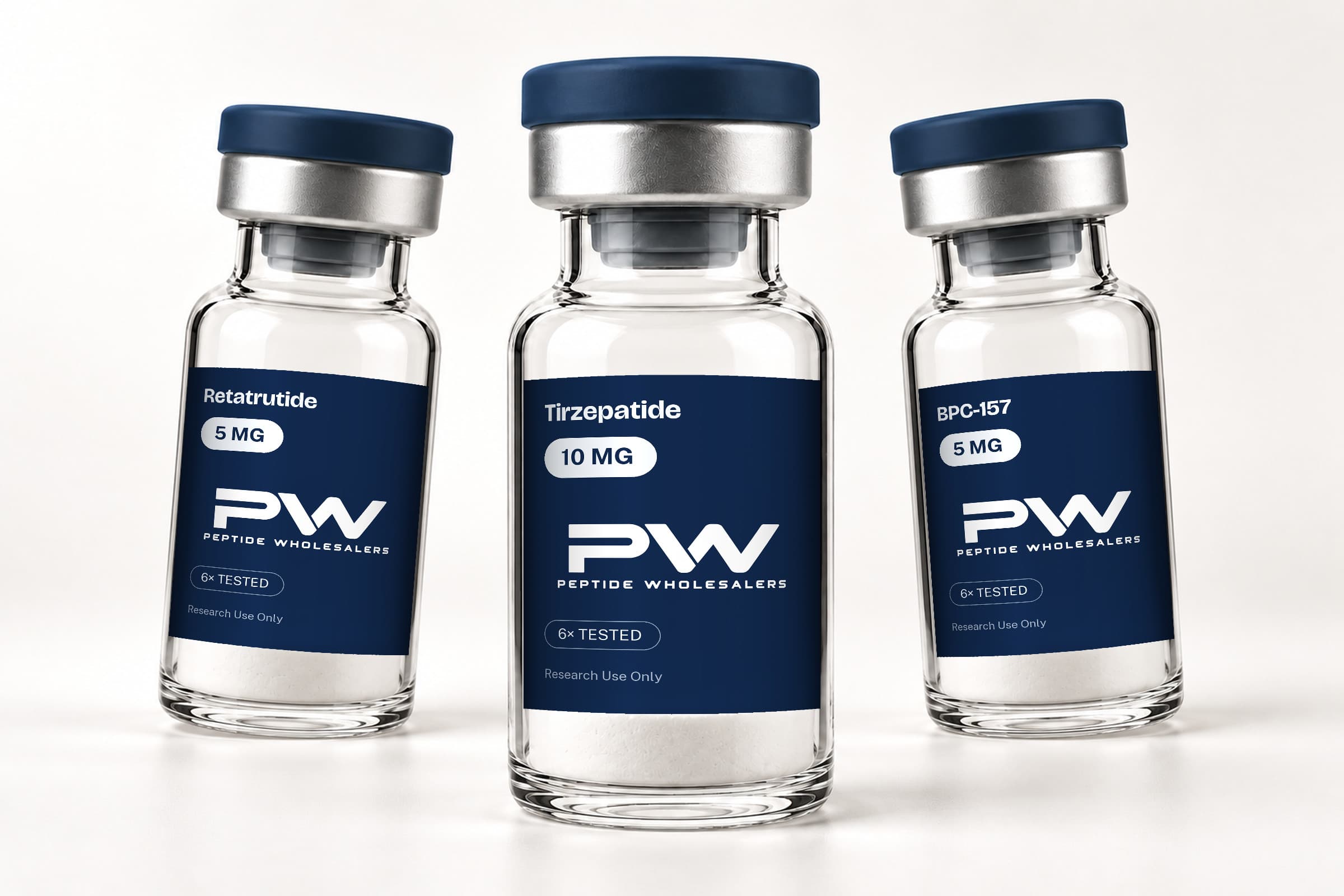 Retatrutide 5 mg, Tirzepatide 10 mg and BPC-157 5 mg vials with Peptide Wholesalers labels